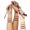 Three hands raised. Each of diffrent skin complexion.