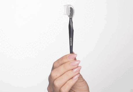 Model holding the razor in diffrent positions